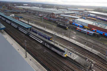 43274 makes a station call & 67005 readies to leave West Yard.jpg (1344969 bytes)